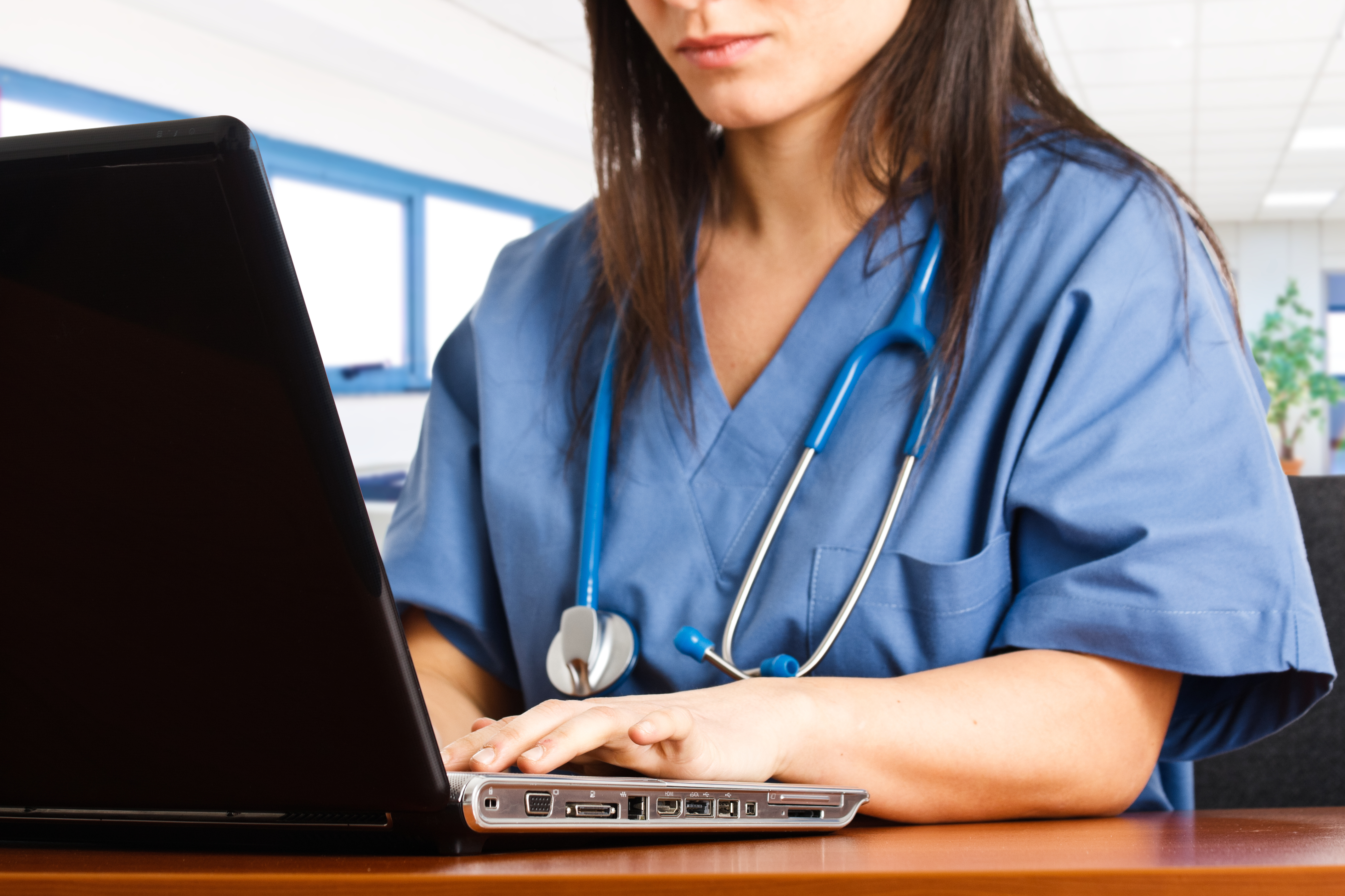 Nurse using laptop