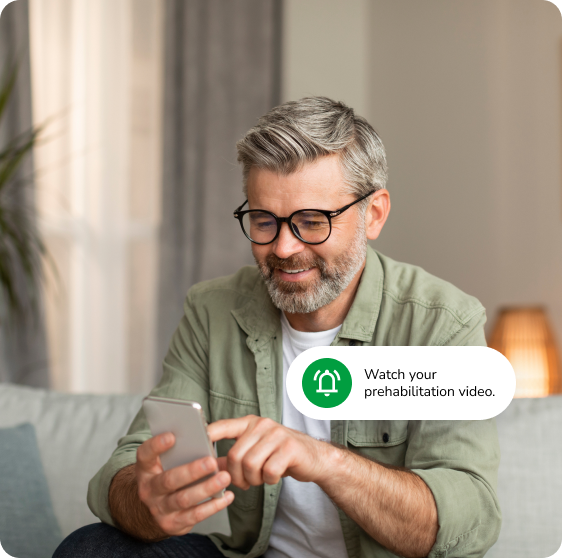 A patient watching a prehabilitation video from a patient engagement app