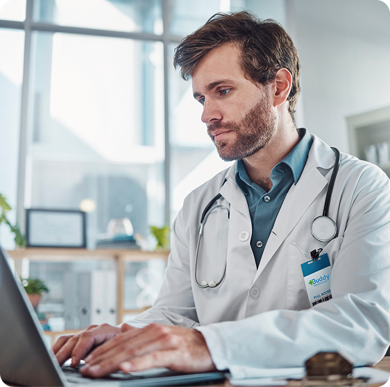 Doctor reviewing patient’s Oxford Knee Score questionnaire results on screen